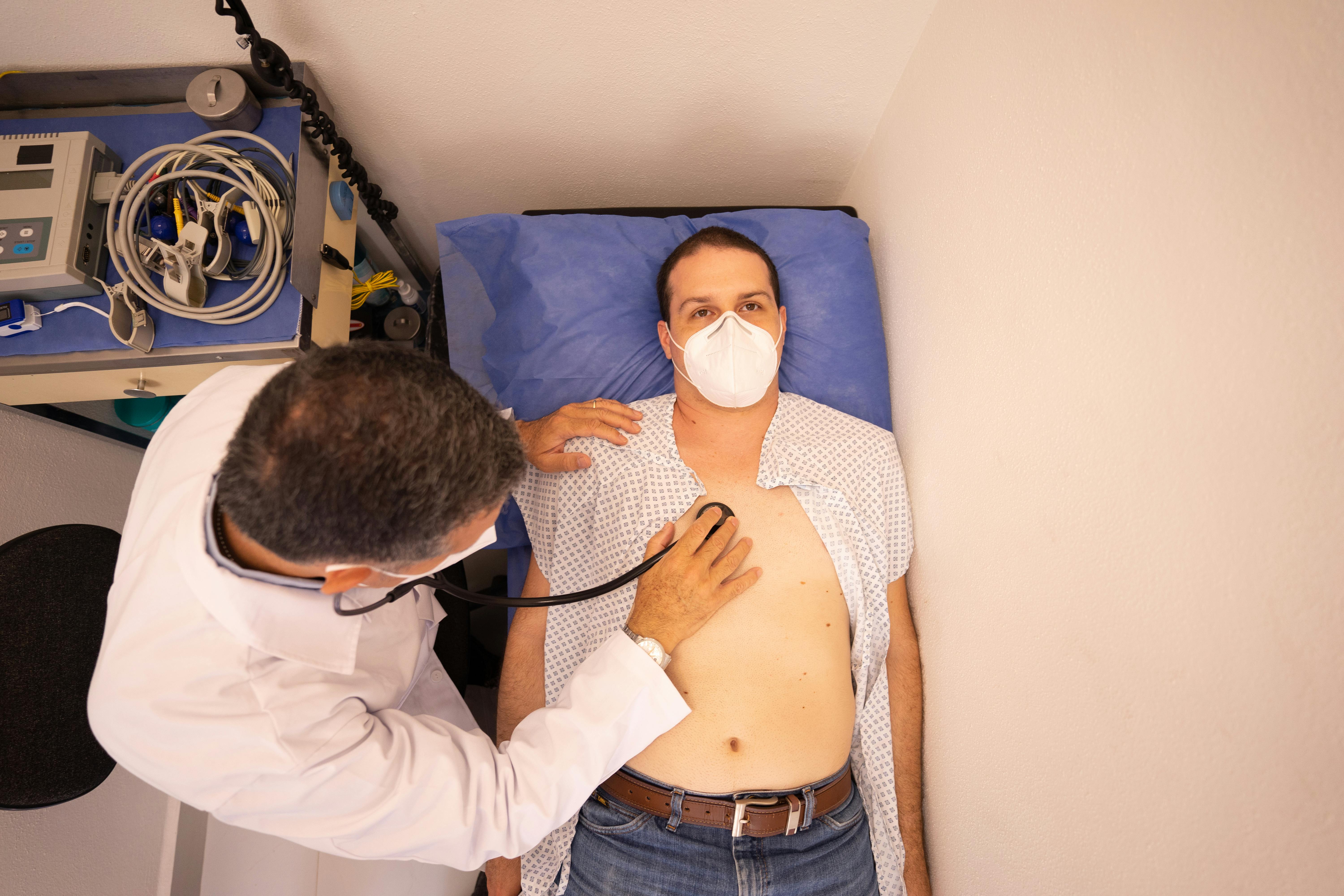 Doctor consulting with senior patient